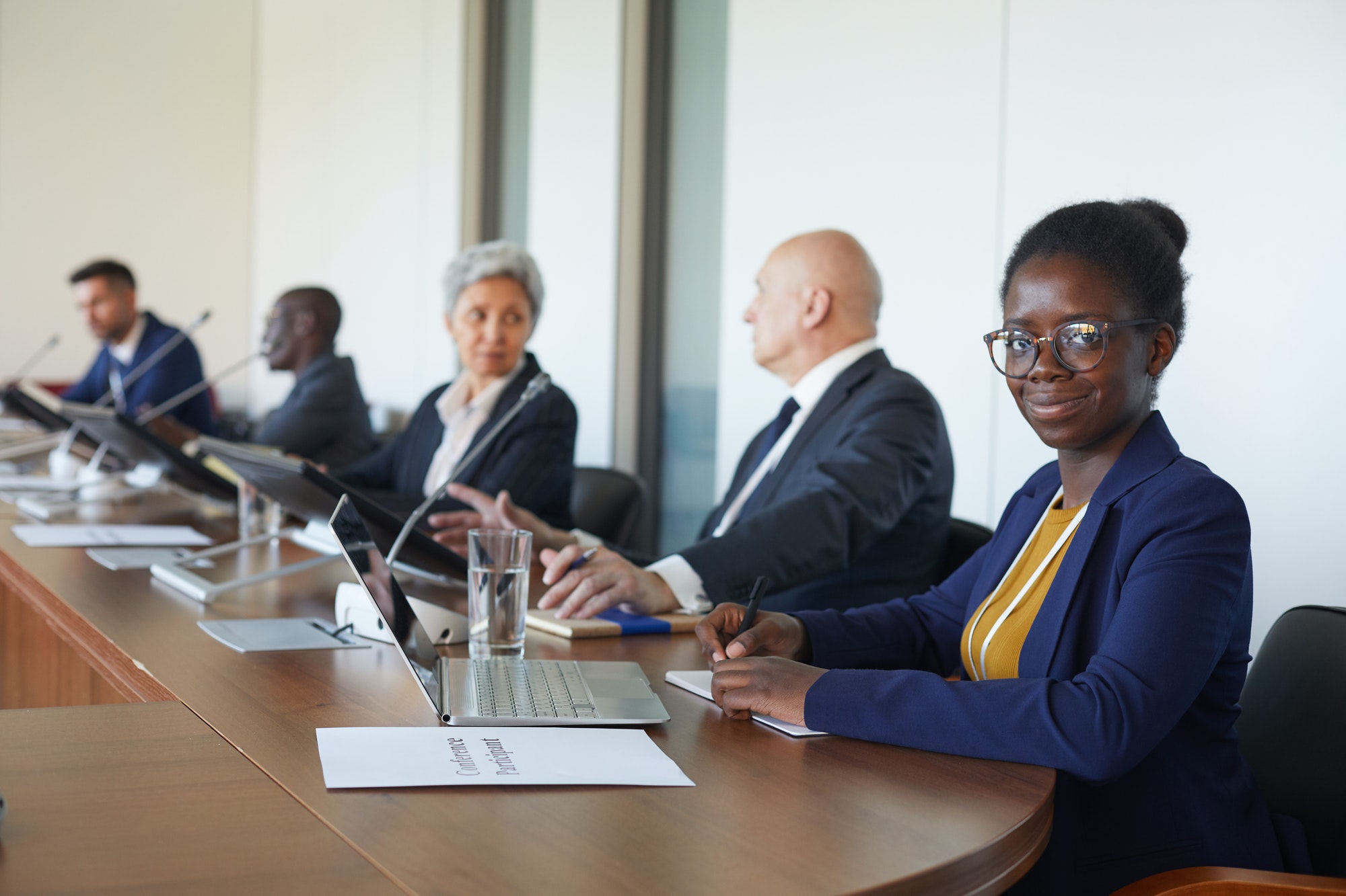 Multiethnic business people at seminar